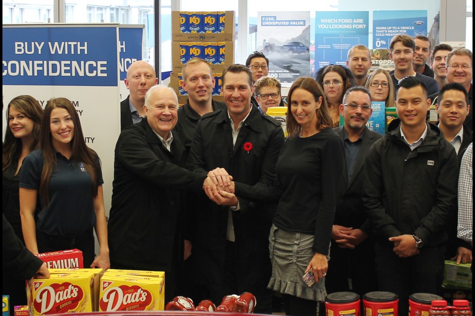Former Mayor Wayne Wright, Canucks legend Kirk McLean and Key West Ford dealer principal Andrea Backman-Galasso joined employees at the dealership to celebrate the We Scare Hunger campaign’s success. Employees then loaded up the donations, which were delivered to the Greater Vancouver Food Bank Society.