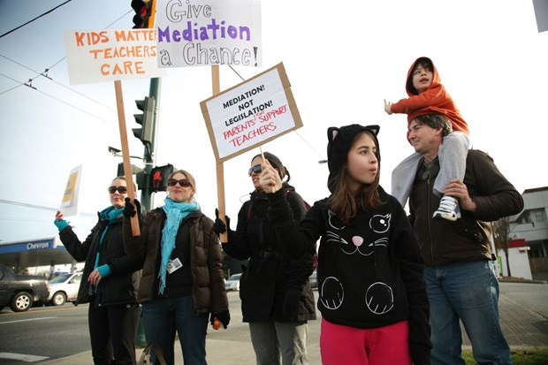 Teachers and supporters from Lord Nelson, Maquinna, Laura Secord and other schools protest on First Avenue and Nanaimo.