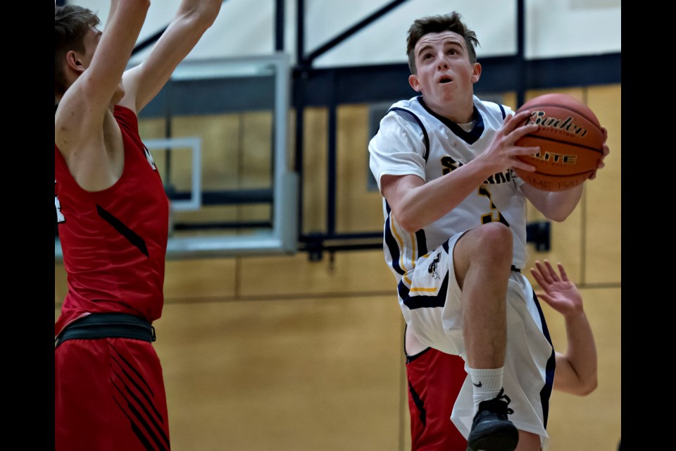 Steveston-London's Zach Cantwell soars to the hoop during his team's thrilling 80-75 overtime win against Lord Byng in the Bob Carkner Memorial Classic championship game on Saturday night.