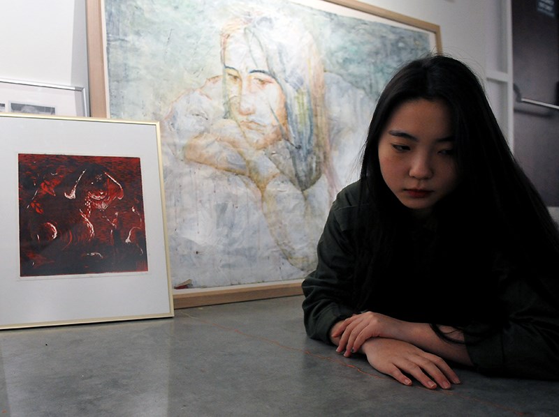Arang Cho of Terry Fox secondary with Blutasia and an untitled painting.