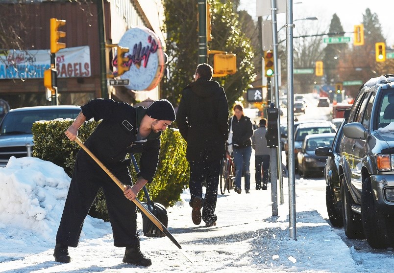 The city’s 311 line was flooded with calls of complaints about perilously icy sidewalks. Photo Dan T