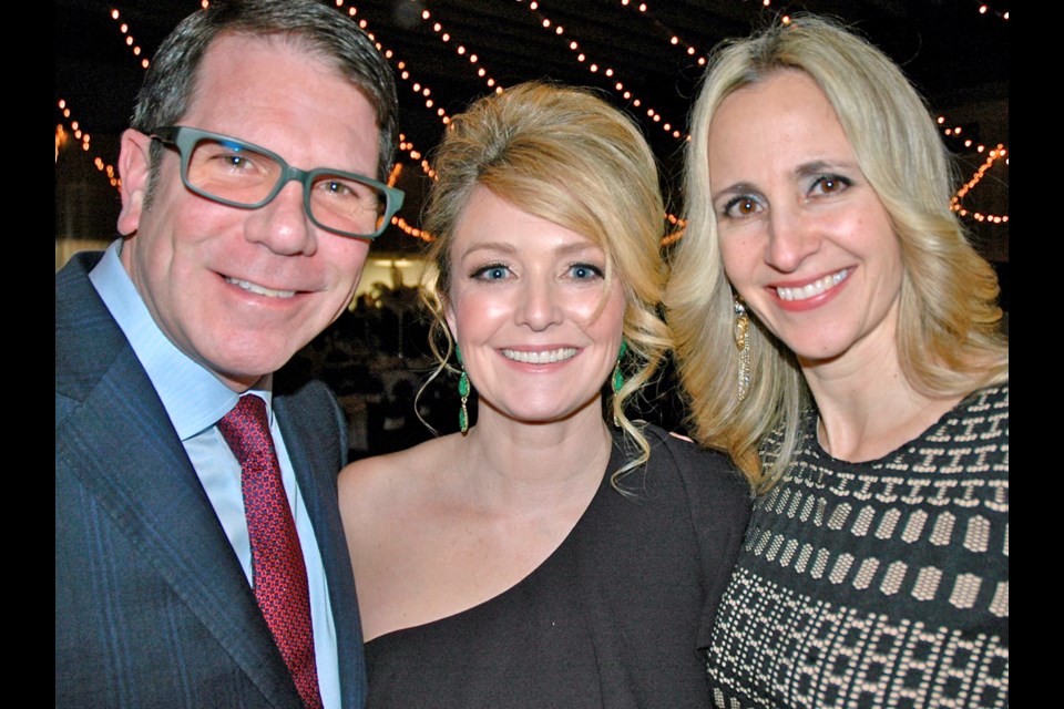 Gala chair Joyce Gillespie, centre, along with committee members Michael Goehring and Angelique Blunk staged Thunderbirds Minor Hockey Association’s premier fundraising event at the Hellenic Centre. The James Bond 007 Thunderball benefit raised monies to keep fees affordable and help financially strapped kids get into hockey.