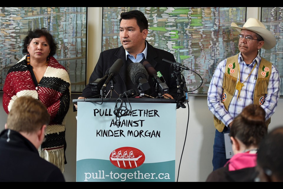 Squamish Chief Ian Campbell (centre), Tsleil-Waututh councillor Charlene Aleck and Coldwater Indian Band Chief Lee Spahan told reporters this week that their nations are seeking judicial reviews of the federal government’s decision to approve Kinder Morgan’s Trans Mountain pipeline project. Photo Dan Toulgoet