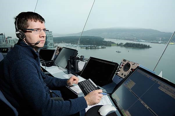 Dave Weston controls the air traffic at Nav Canada's Vancouver Harbour Air Control Tower high above Granville Square at 200 Granville St.