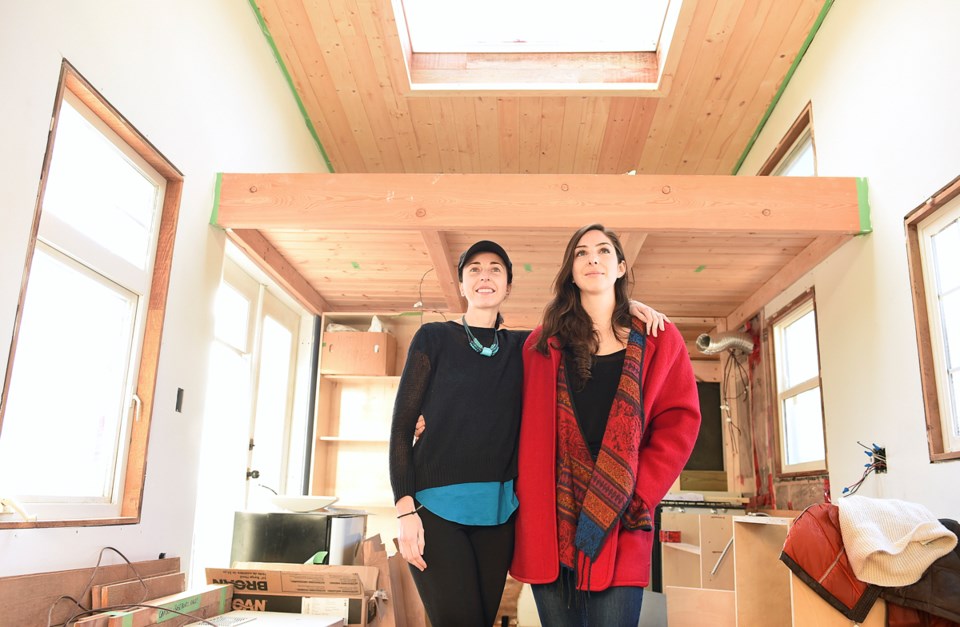 Anastasia Koutalianos and Samantha Gambling (right) cofounded the B.C. Tiny House Collective in July