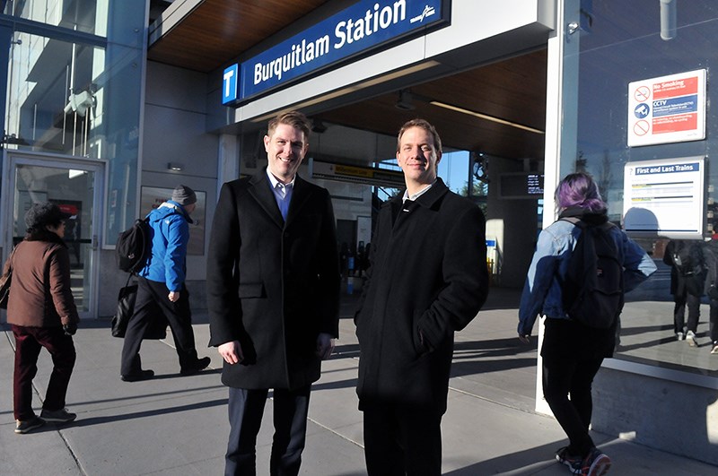 Coquitlam city planners Andrew Merrill and manager Carl Johannsen today at Burquitlam Station, which opened on Dec. 2. The pair is leading the Burquitlam-Lougheed Neighbourhood Plan, a visioning document that proposes 20,000 more residents along the North Road corridor over the next 20 to 25 years.