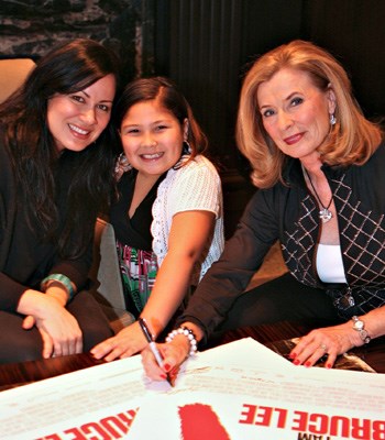 Bruce Lee's widow Linda Lee-Cadwell, daughter Shannon and granddaughter Wren Lee-Keasler signed movie posters at the Rosewood Hotel Georgia reception.