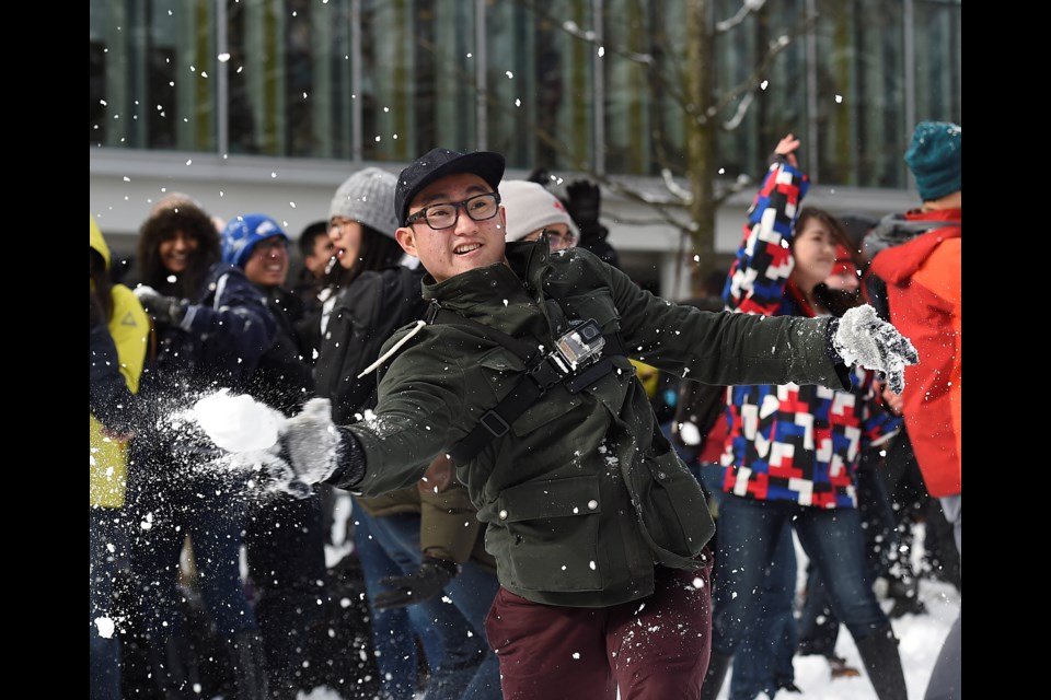 Hundreds of students took part in a massive snowball fight at UBC Monday afternoon. Photo Dan Toulgoet