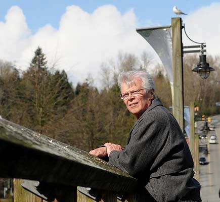 Co-chair of the East Fraserlands Committee Milt Bowling keeps an eye on the River District at Kerr and Kent Avenue.