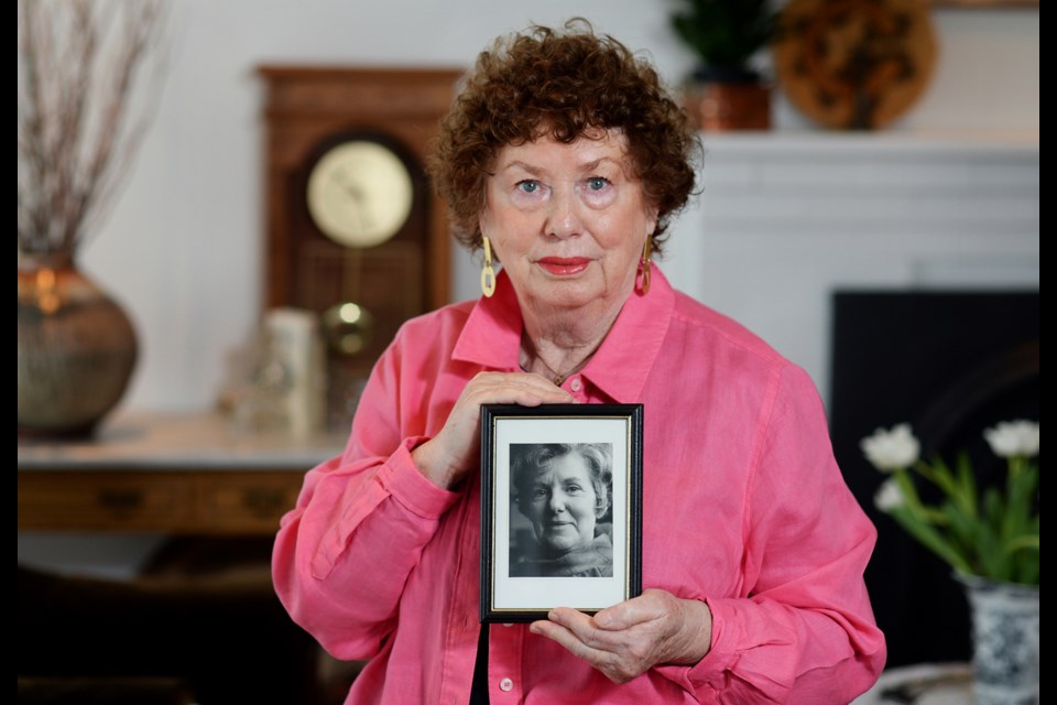 Gale Tyler holds a photo of her mother, Jane, in whose honour she has set up a legacy fund to help women in need pursue post-secondary education. She’s holding a fundraising concert on Friday, Feb. 24 at the Lochdale Hall in North Burnaby, featuring award-winning Canadian folk singer Valdy.