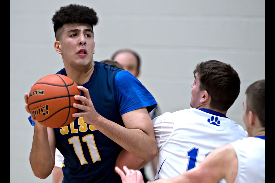 City MVP Fardaws Aimaq poured in 44 points and collected 25 rebounds in leading the Steveston-London Sharks to their second straight Richmond Senior Boys Championship with a 94-87 win over the McMath Wildcats on Thursday night at McNair Secondary.