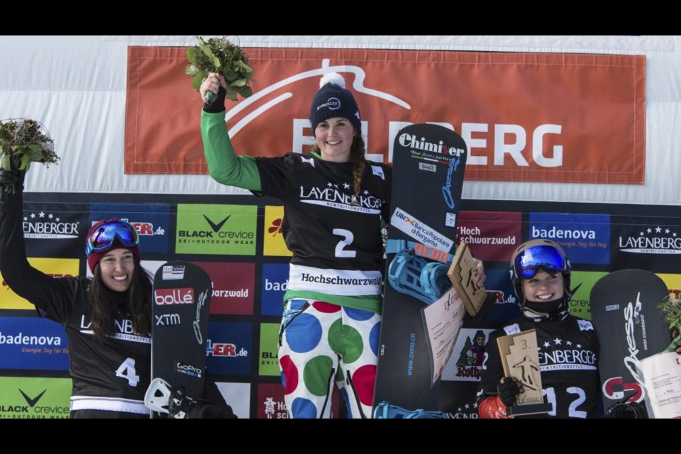 Meryeta O'Dine of Prince George, right, celebrates her first Wor;d Cup snowboard cross medal Saturday in Feldberg, Germany. O'Dine won the bronze medal and went on to post a 13th-place finish in Sunday's race. Joining her on the podium Saturday were gold-medalist Michela Moioli of Italy, centre, and Belle Brockhoff of Austria.