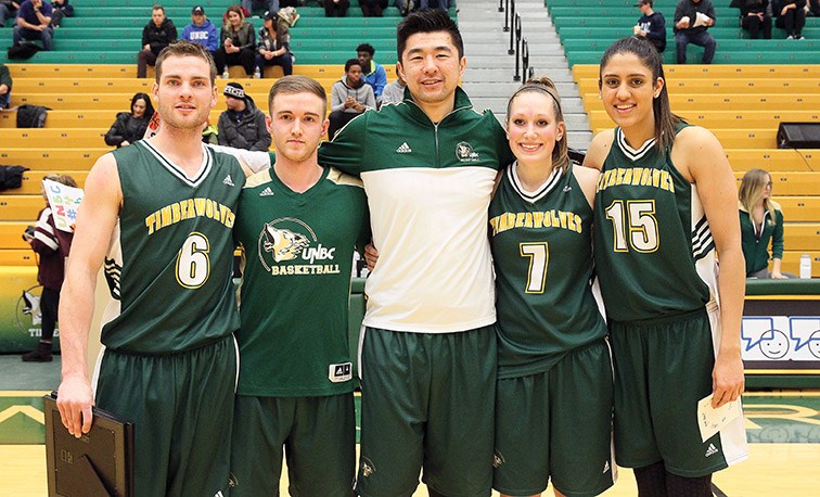 The UNBC Timberwolves' graduating seniors got together for a photo before the men's team took on the Saskatchewan Huskies Saturday at the Charles Jago Northern Sport Centre. From left are Rhys Elliott, Elliot Rowe, Sam Zhang, Stacey Graham and Preety Nijjar.