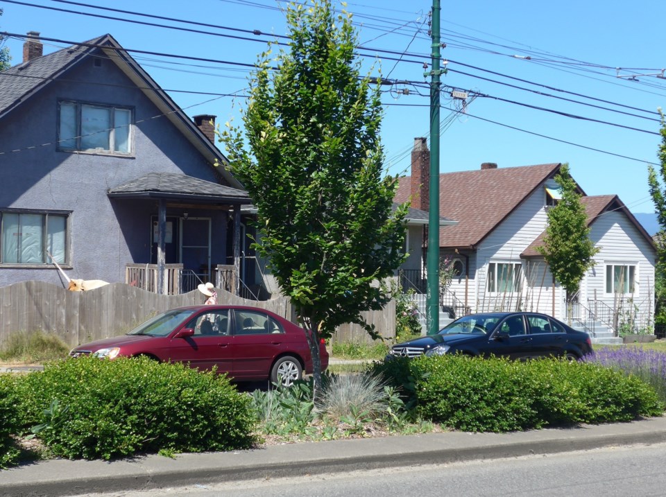 Do you think these are character homes? Some people do. Photo Michael Geller