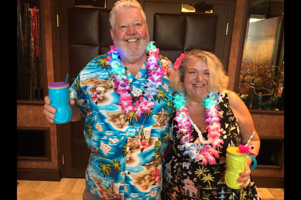 Aloha-wear was the approved attire for our Blue Hawaii-inspired wedding reception, which we held in a Spa Suite at the Golden Nugget Resort and Casino in Las Vegas.