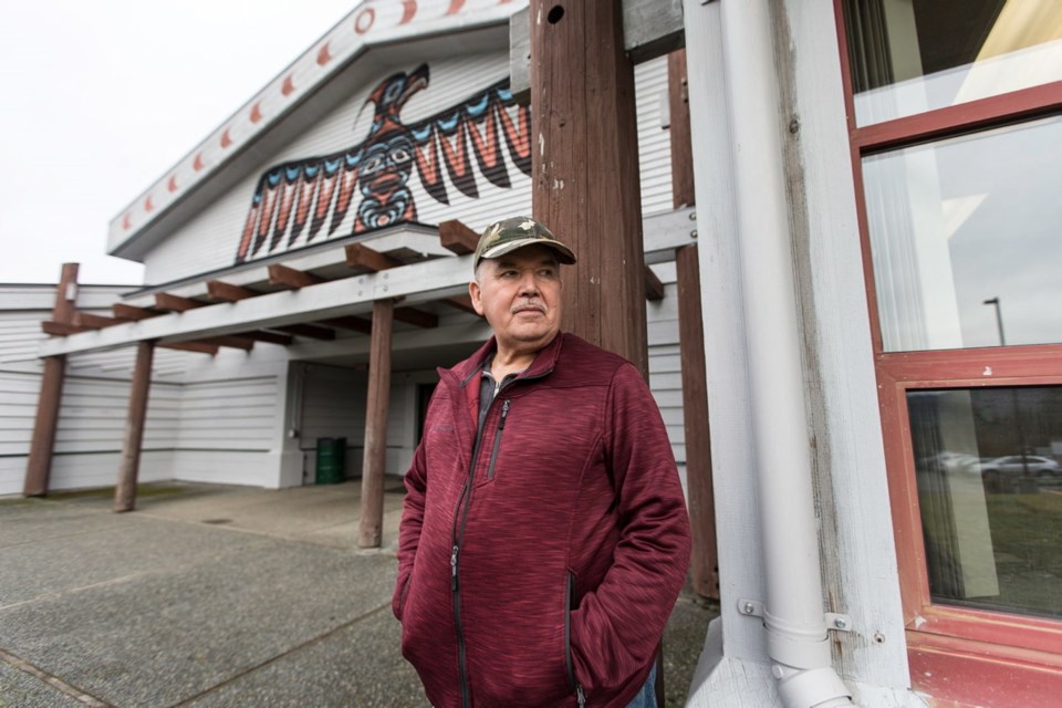 Tsartlip elder John Elliott, seen at the Lau Welnew Tribal School, is working to preserve traditional First Nation language, stories and practices.