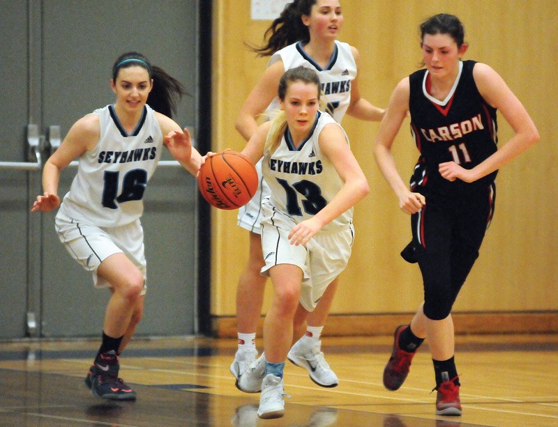Kayla Krug leads the break for the Seycove Seyhawks during a North Shore league game. Krug was named MVP as the Seyhawks won the Lower Mainland AA title last week. photo Cindy Goodman, North Shore News