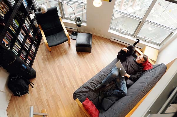 Martin Knowles in his apartment on Seymour Street, shot from the loft.