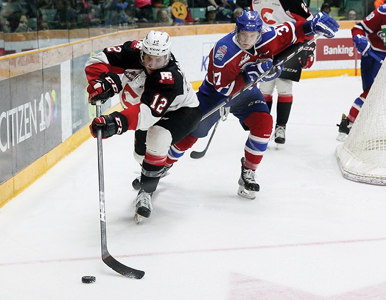 Cougars-Oil Kings action