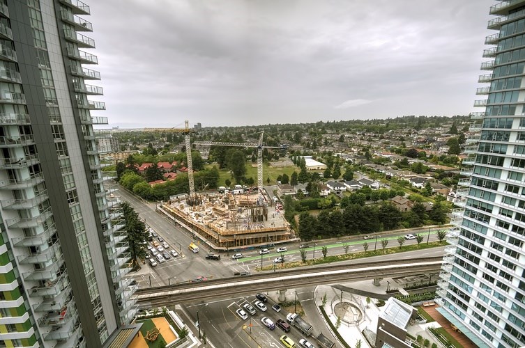 Apartment buildings along the Marine Drive corridor near Cambie Street in Vancouver. The look and de