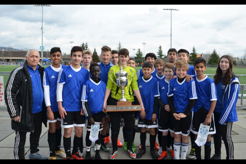 The Royal City boys under-14 Impact won its league title and the district Pioneer Cup, beating Squamish 2-1 in penalty kicks.