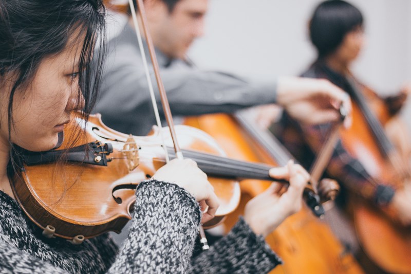 Vancouver Chamber Music Society musicians Jae-Won Bang, Ariel Barnes and Luke Kim rehearse for their upcoming concert at West Vancouver United Church.