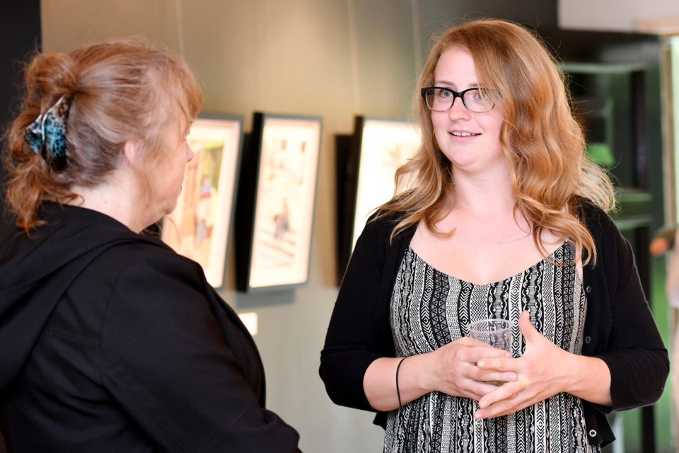 Artist Jessie McNeil is seen at the opening of her Urban Subjects exhibition at Deer Lake Gallery in June 2016. Her work is featured in an upcoming off-site exhibition of Burnaby Art Gallery, at the McGill library branch.