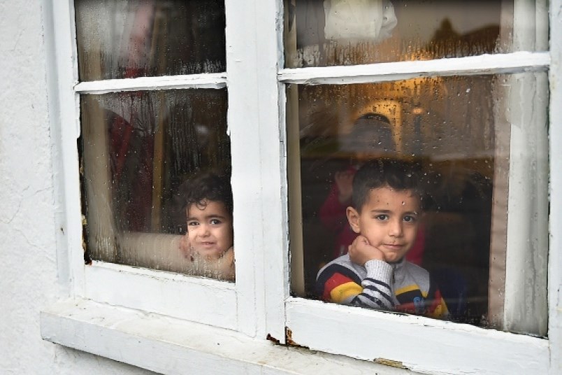 This is one of three photos by photographer Dan Toulgoet that have been nominated for Ma Murray newspaper awards. This photo appeared with Mike Howell's story about how the 2400 Court Motel on Kingsway became an almost instant community of Syrian refugees, with more than 200 people living in the iconic landmark.