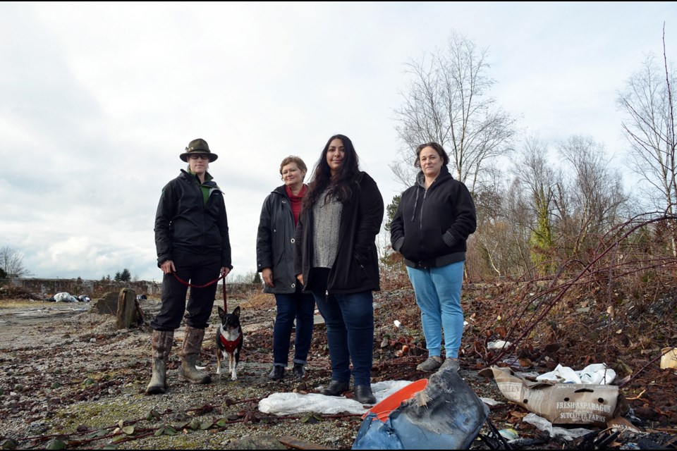 From left, Riverside residents Patricia Gonsalves, Elena Zhukova, Shairose Lila and Diana Simas are fed up with the unsightly mess at 7647 Willard St. The property was the site of the Globe Foundry until it closed in 2011. Since then, it’s been used as a dumping ground for trash and unwanted items, and neighbours are sick of it. They want the city to step in and clean it up.