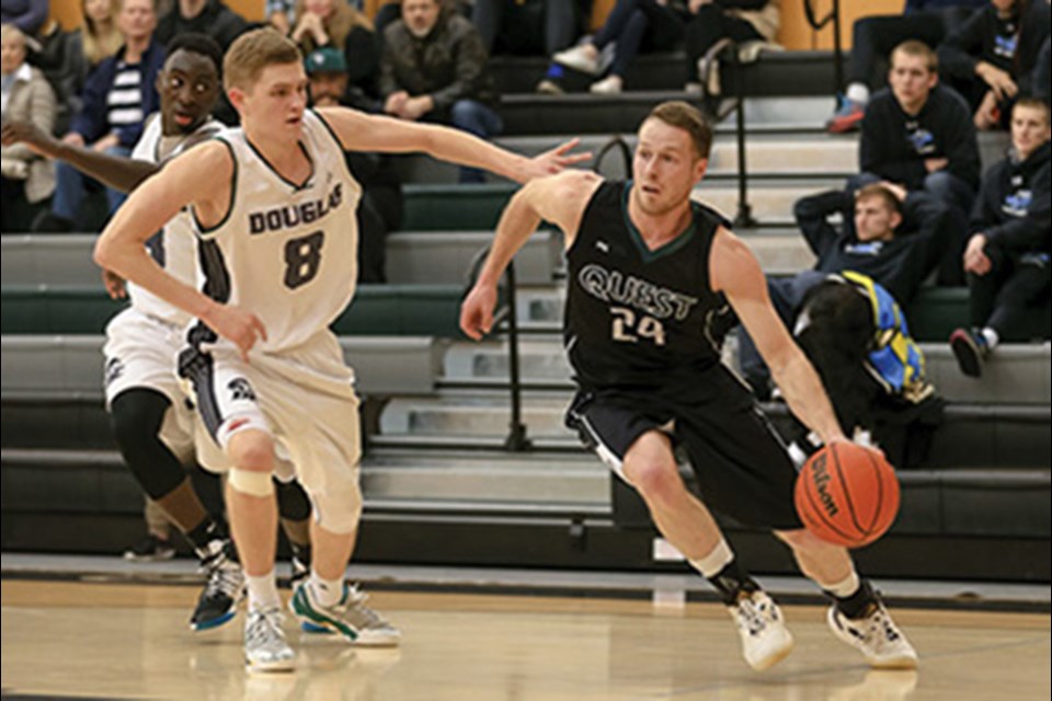 Quest Kermodes Men’s team senior player, Theo VandenEkart dribbles past Josh Mayorga of the Douglas Royals during this weekends PACWest Provincials hosted at Quest. Photos Courtesy of Quest Kermodes