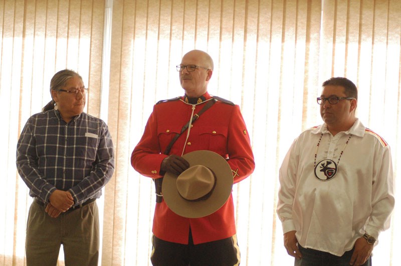 Keewatin Tribal Council cultural support provider Lloyd Daniels, Thompson RCMP Special Const. Rob Cleveland and Barren Lands First Nation Chief John Clarke.