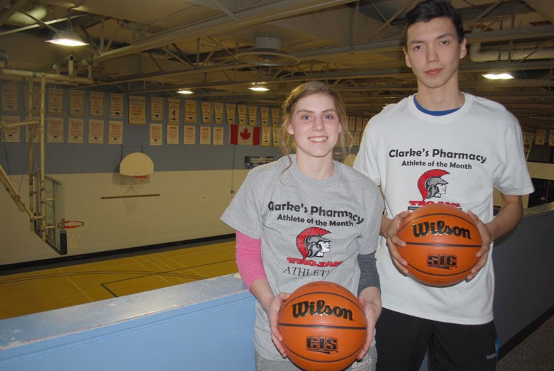 Grade 12 students Jamie Verhaeghe, left, and Dale Cook, right, are R.D. Parker Collegiate’s athletes