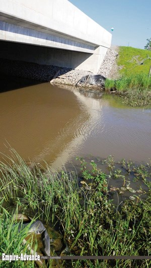 The isolated site where Joyce Braybrook’s stolen purse was fished out of a creek, May 27, at the bridge on the QEW Hwy from Niagara Falls to Fort Erie.