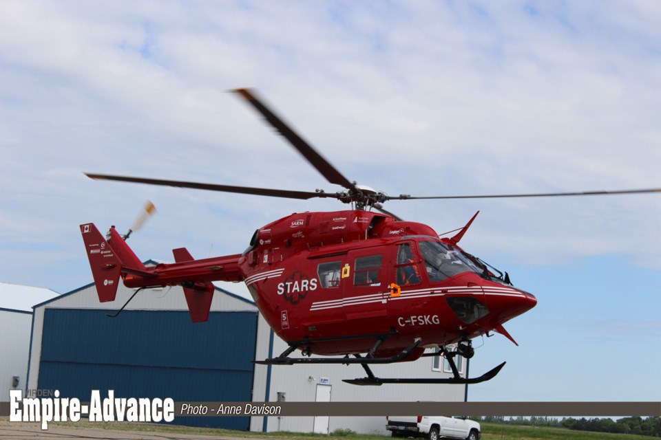 Following a rendezvous with WDFD Chief Brad Yockim, to kick-start Yochim's Rescue on the Island fundraiser, STARS helicopter lifts off the tarmac at Virden regional airport enroute to Regina.