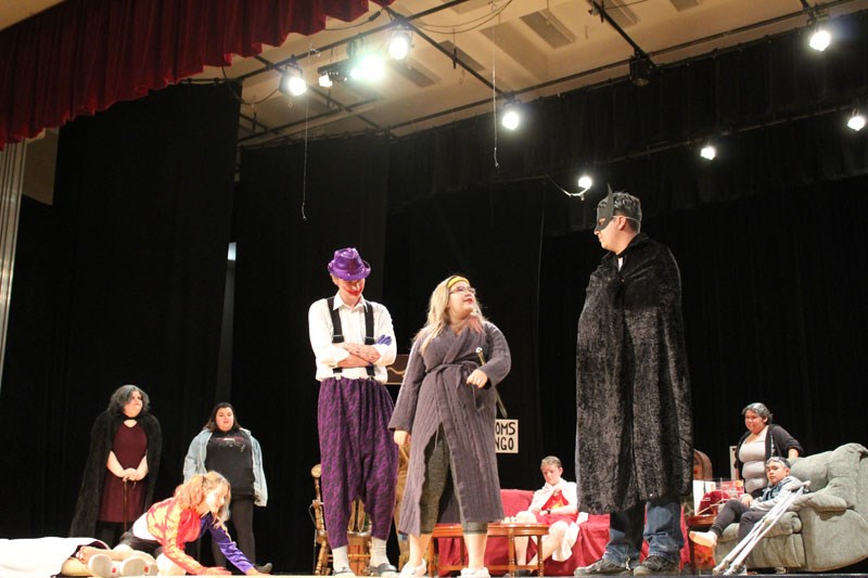 Members of the RDPC Grade 11 drama class perform their original play titled Super Retired June 22