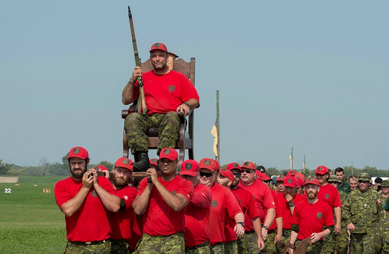 Canadian Ranger Sam Cocquyt of the Gillam Patrol is carried off the range by his fellow Canadian Rangers as the top Canadian Ranger shooter at CAFSAC 2017.