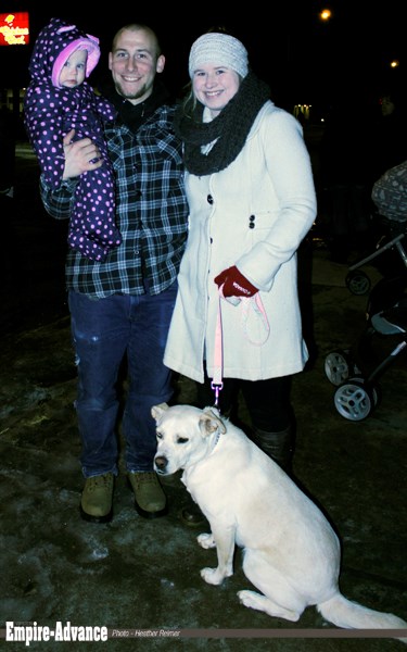 Cody Mulligan, Beth McConnell, bring their daughter Willow to her first ever parade along with Luna the rescue dog.