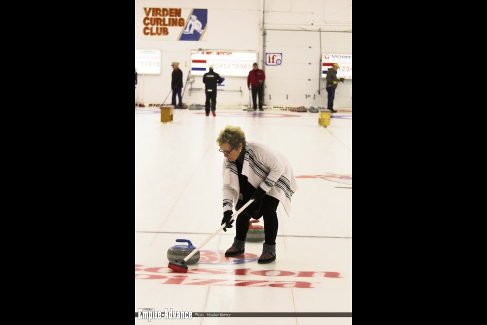 Carol Anne Trowell is one of about 2 dozen local people who have embraced the sport of stick curling and came out to welcome Rob Swan to town.
