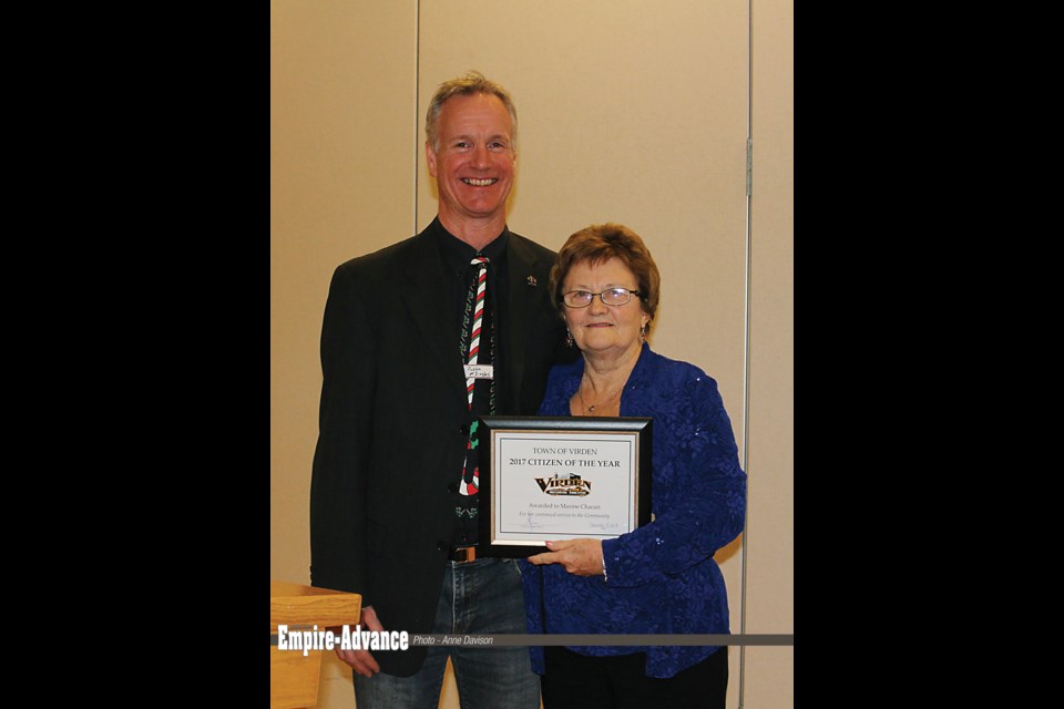 Virden Citizen of the Year Maxine Chacun is awarded by Mayor Jeff McConnell, Dec. 2 at the Virden Annual Holiday Banquet held in Sunrise Credit Union Banquet Hall.