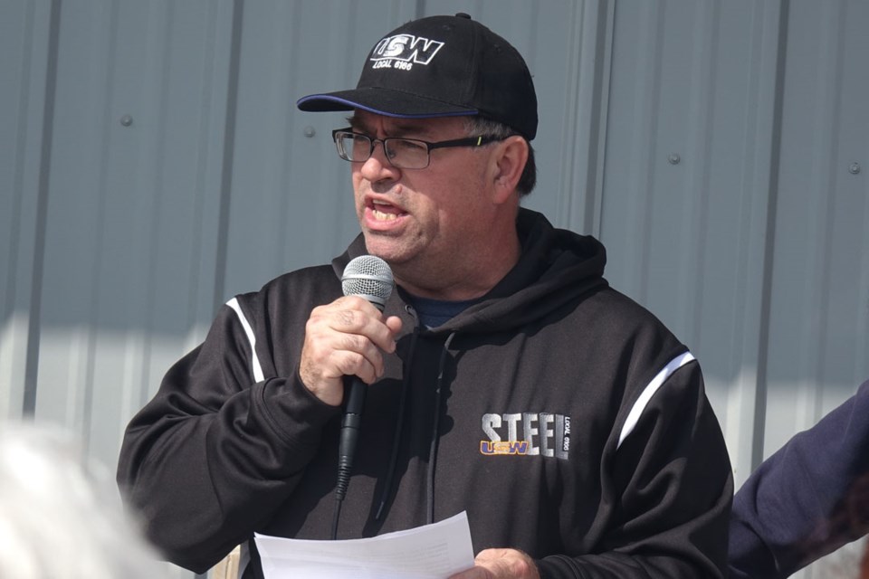 United Steelworkers Local 6166 president Les Ellsworth addresses union members during Labour Day fes