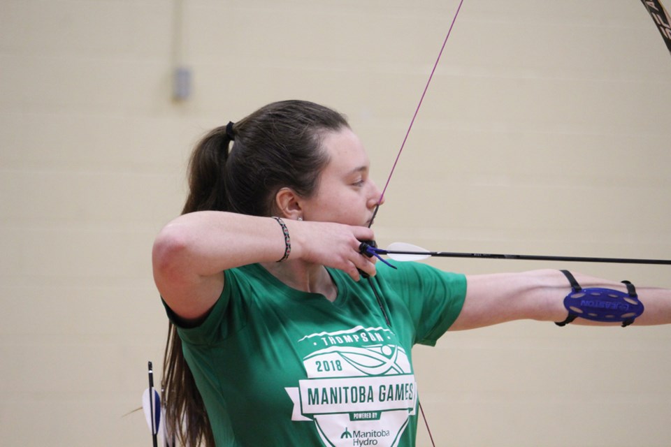 Birtle archer Victoria Saliyeva competing at MB Winter Games. Wins Gold and Bronze medals.