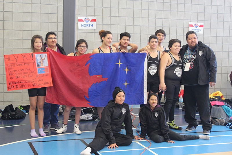 Members of Team North team pose for a photo once all their wrestling events wrapped up on March 9. T