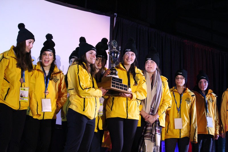 Athletes representing Team Winnipeg Gold celebrate after being awarded the J.A. Ernst Spirit of the