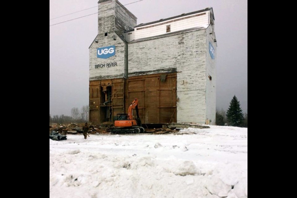 A former United Grain Growers elevator, believed to have been built around 1950 and considered a local landmark, was demolished at Birch River, Man. last week.