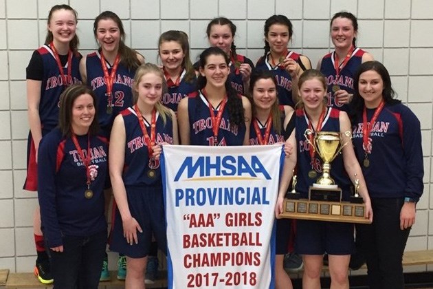 R.D. Parker Collegiate's senior girls' basketball team poses with their provincial championship bann