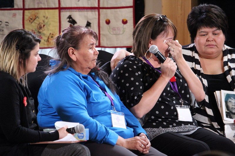Susan Clipping (centre left) and Christine Merasty (centre right) testify before the National Inquiry into Missing and Murdered Indigenous Women and Girls during their second day of community hearings in Thompson on March 21. They are the sister and daughter of Clara Dantouze, who was killed in 1973 at the age of 21. Photograph by KYLE DARBYSON.