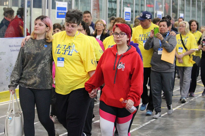 Cancer survivors weren’t alone during the opening lap of the April 28 Relay for Life in Thompson, si
