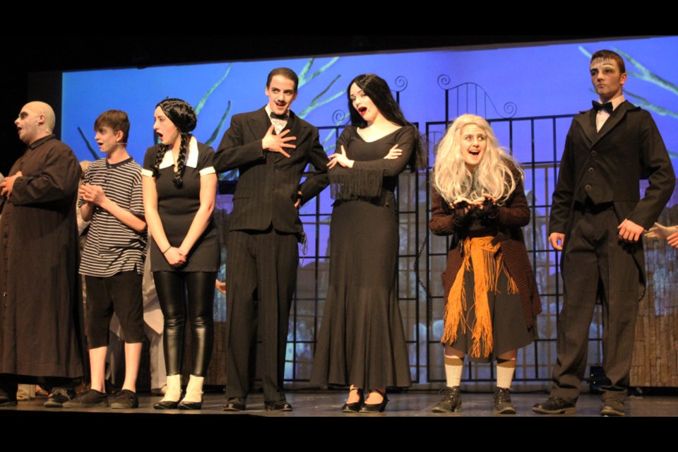 The Addams Family now playing at the Aud Theatre. Virden Collegiate is staging this musical comedy starring (l-r) Shane Groom (Fester), Garett Krieser (Pugsley), Laurel Eslinger (Wednesday), Dane Leslie (Gomez), Emily Cochrane (Morticia), Ruth Thiessen (Grandma) and Heinrich Neufeld (Lurch).