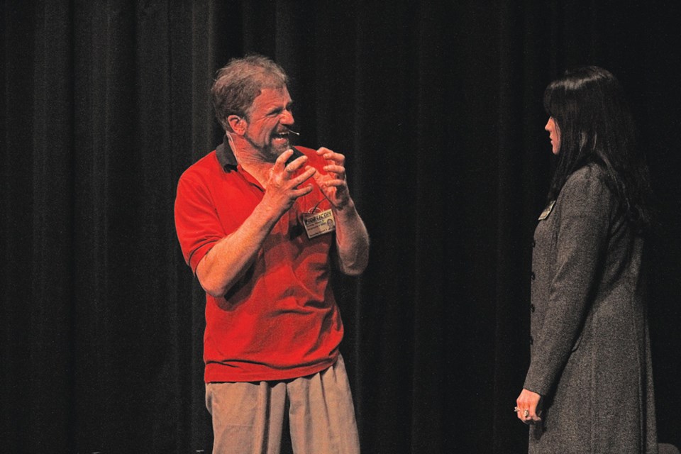 Virden playwright and actor/director George Baker in the closing moments of his drama, “F2764”. In his role, Baker is deeply conflicted as a bereaved and lonely husband and the architect of a beautiful robotic dream girl. Playing opposite Monelle Lestrat - his boss - he expresses his innermost anguish.