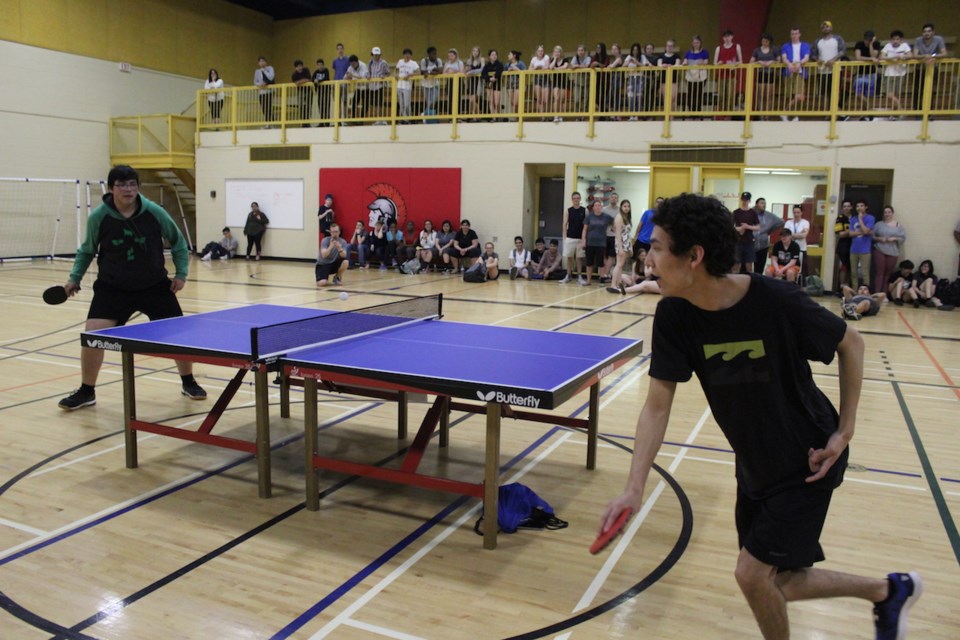 Daryn Erikson (right) returns the ball to Mark Fortin (left) in the final round of the second annual Dylan Cripps Memorial Table Tennis Tournament, which took place at RDPC on May 24. Photograph by KYLE DARBYSON.